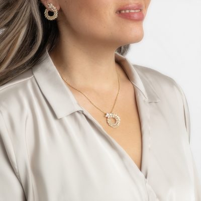 Goudkleurige Ketting en Oorbellen met Zirkonia steentjes